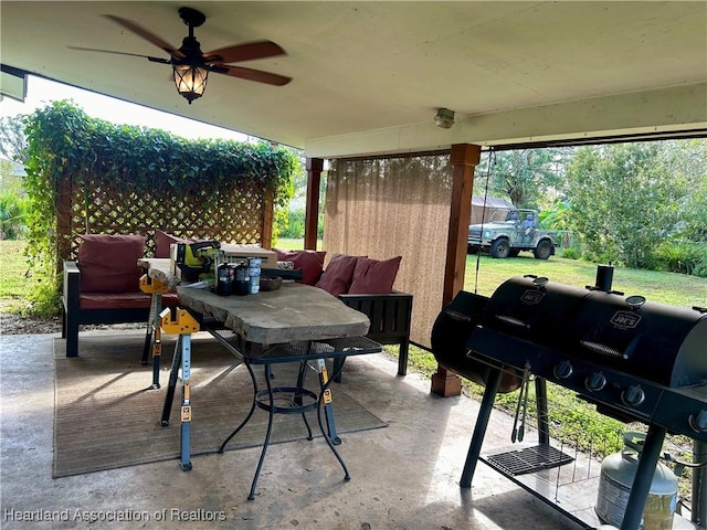 view of patio / terrace with grilling area and ceiling fan