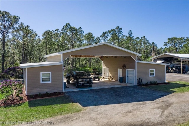 view of front of house featuring a carport