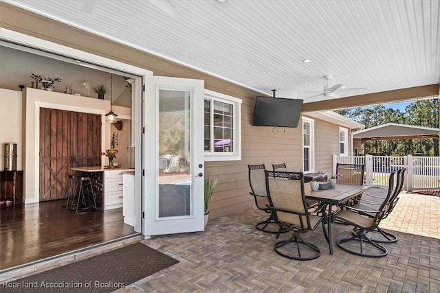 view of patio with ceiling fan