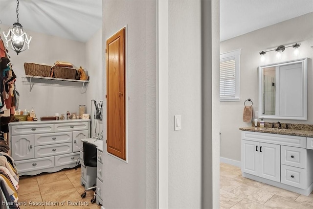 bathroom featuring vanity and tile patterned floors