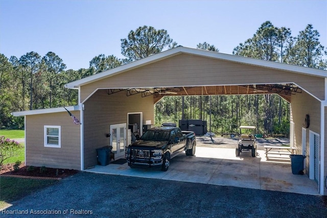 view of car parking with french doors