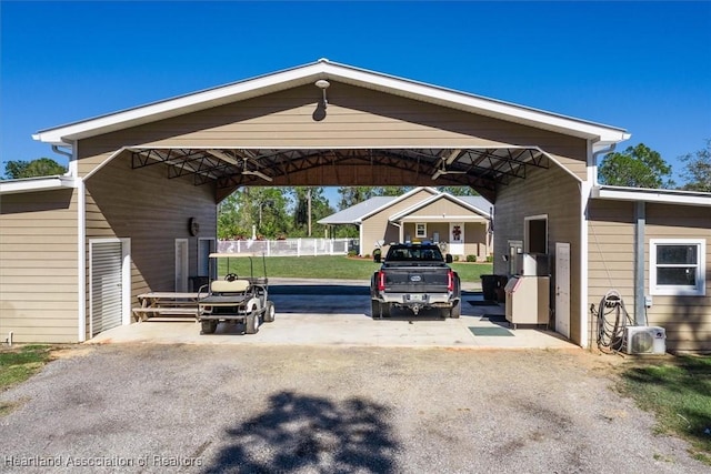 view of parking featuring a carport