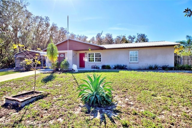 single story home featuring a front yard