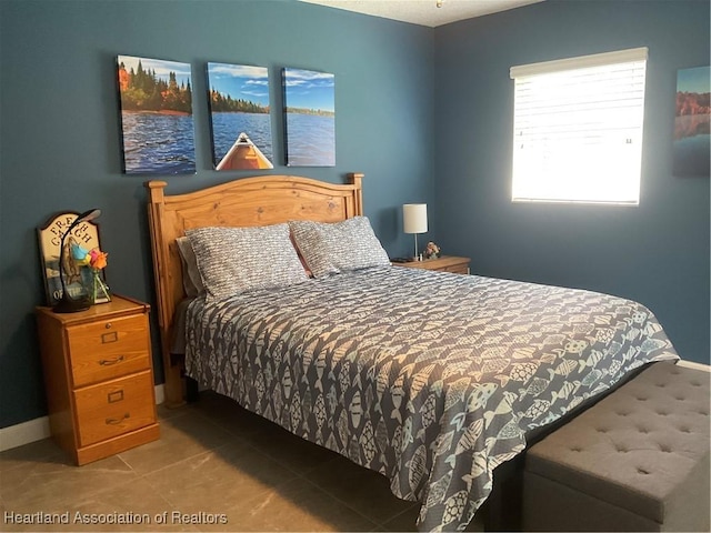 bedroom with a water view