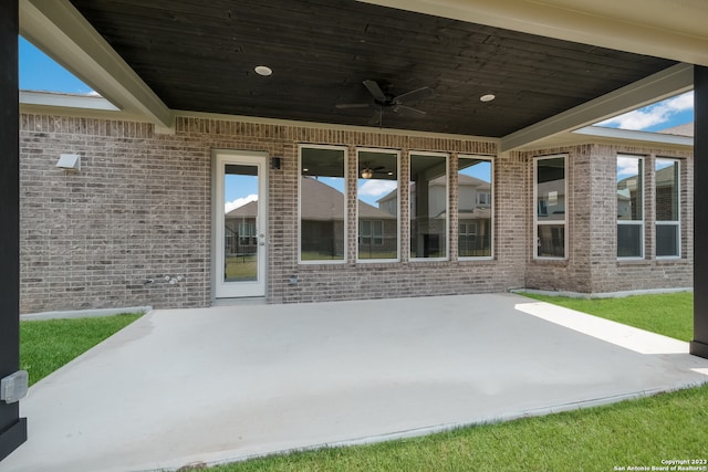 view of patio featuring ceiling fan