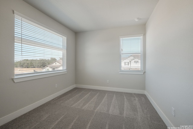 view of carpeted spare room