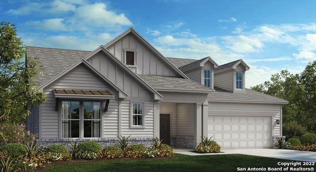 view of front facade featuring a garage and a front yard