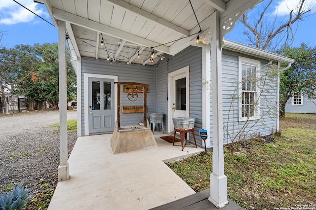 doorway to property featuring a patio