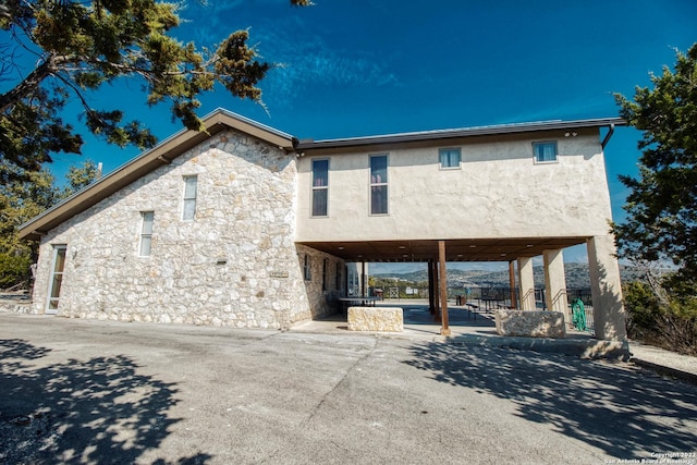 view of front of house featuring a patio