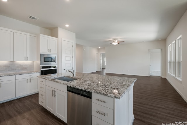 kitchen featuring white cabinets, appliances with stainless steel finishes, sink, and ceiling fan