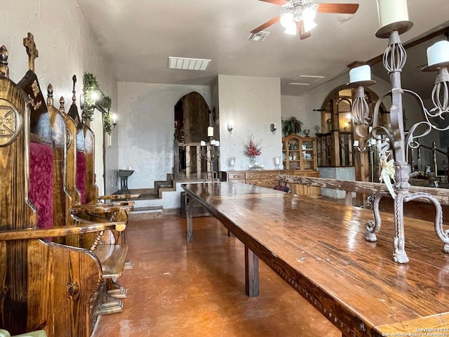 interior space featuring ceiling fan