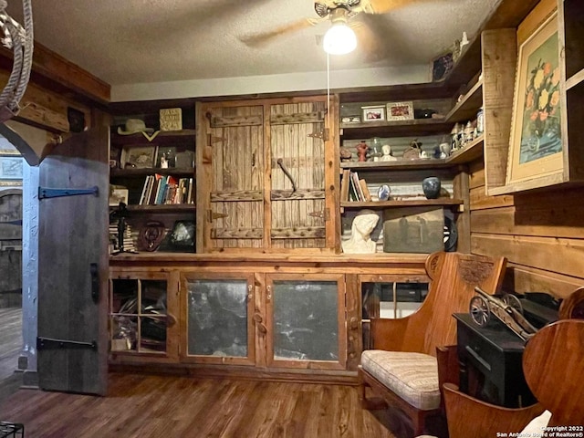 interior space featuring ceiling fan