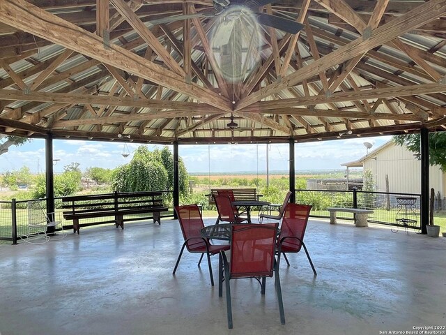 exterior space featuring vaulted ceiling