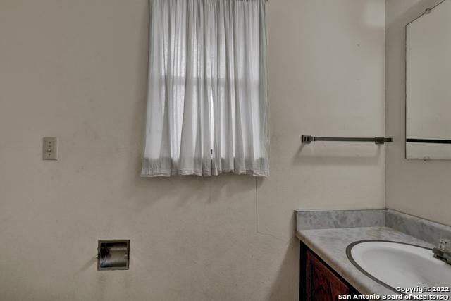 bathroom with large vanity