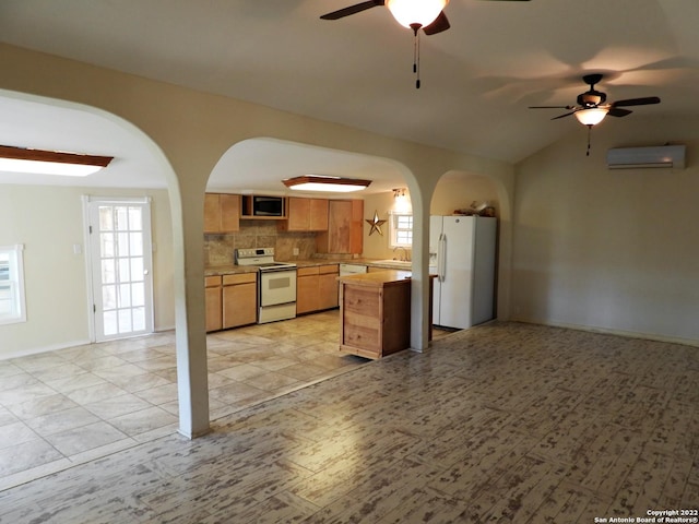 kitchen with backsplash, white appliances, light tile flooring, and ceiling fan