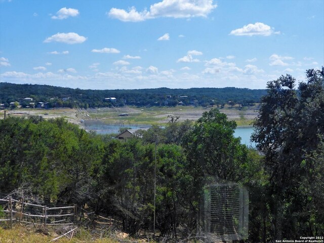 property view of water with a rural view