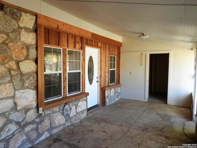 property entrance featuring a patio