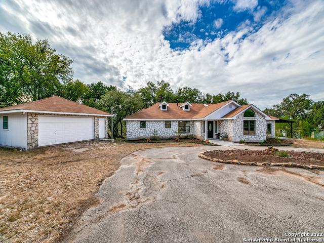 single story home with a garage