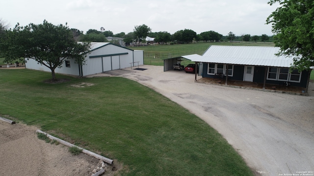 view of yard featuring a carport