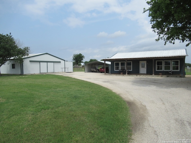 view of yard with a carport