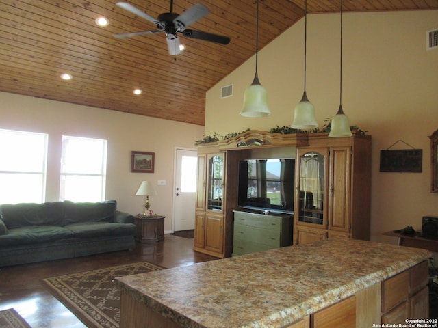 kitchen featuring hanging light fixtures, stone counters, ceiling fan, high vaulted ceiling, and wooden ceiling