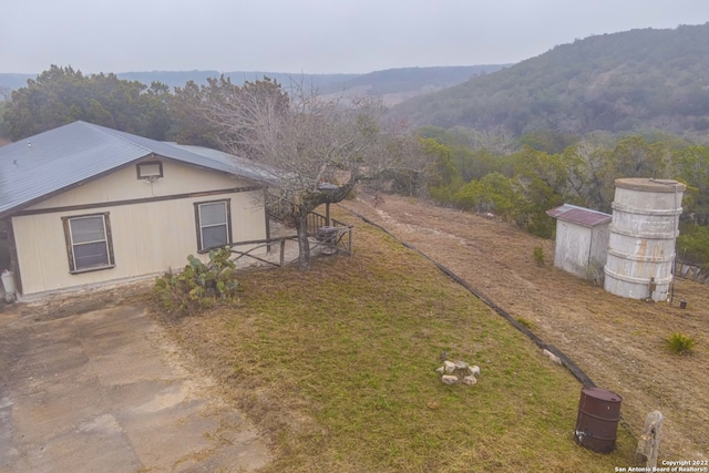 exterior space featuring a mountain view