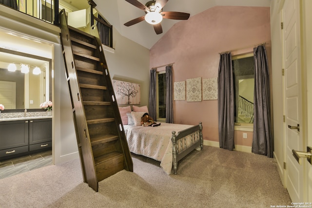 carpeted bedroom featuring high vaulted ceiling, ceiling fan, and sink