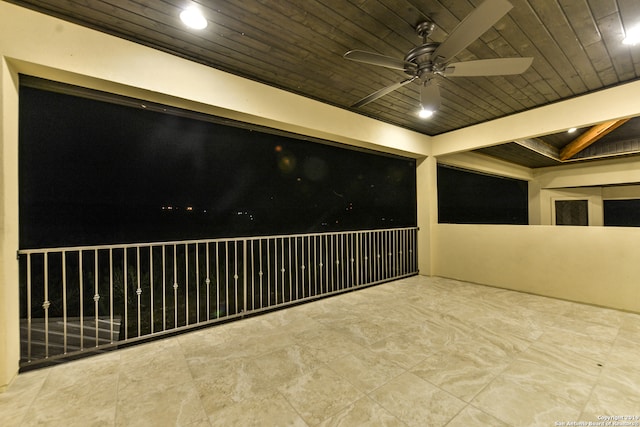 cinema featuring wooden ceiling, ceiling fan, beam ceiling, and light tile floors