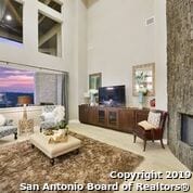 living room with a towering ceiling