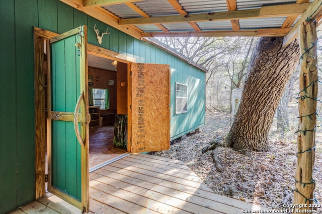 wooden deck featuring a pergola