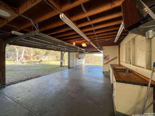 119 Cedar Tree Ln, Canyon Lake, TX 78133 - garage featuring sink