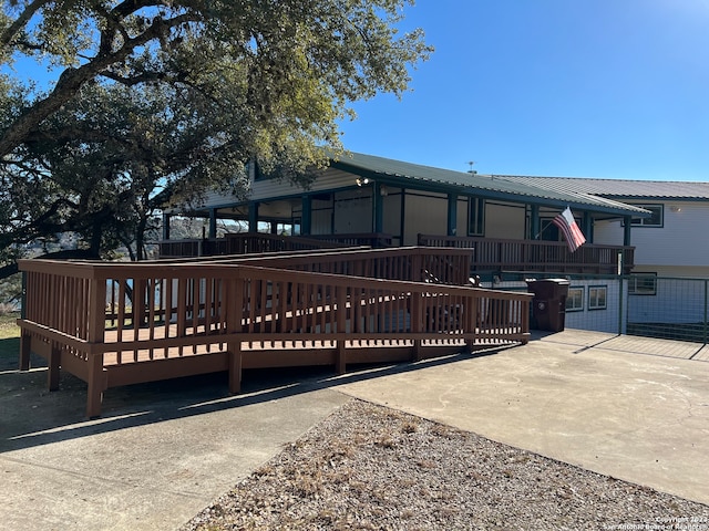 119 Cedar Tree Ln, Canyon Lake, TX 78133 - back of property featuring a wooden deck