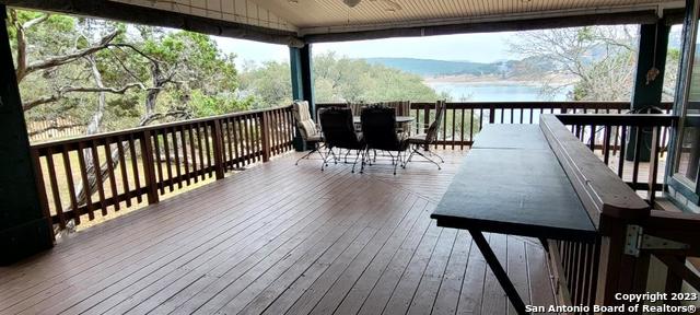 119 Cedar Tree Ln, Canyon Lake, TX 78133 - view of wooden deck