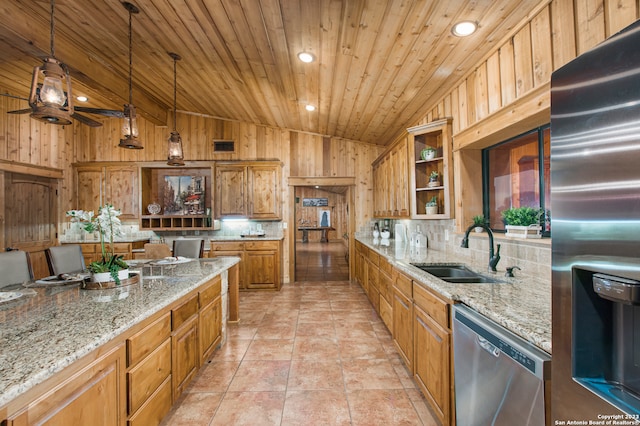 kitchen with hanging light fixtures, lofted ceiling, appliances with stainless steel finishes, sink, and wood ceiling