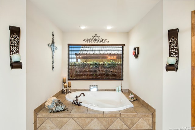 bathroom with tiled bath