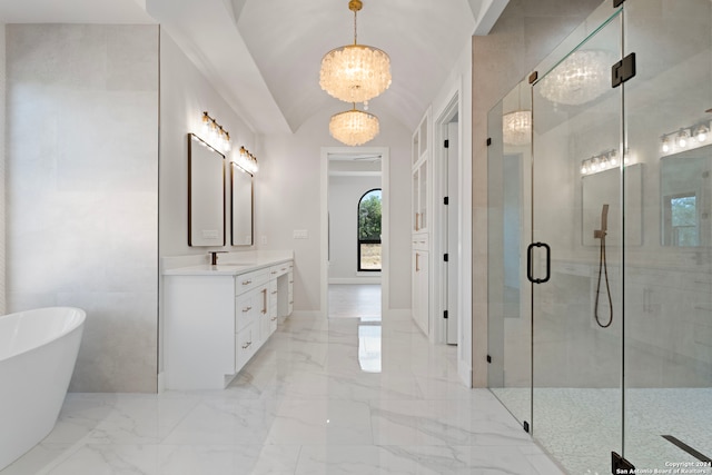 bathroom with vanity, lofted ceiling, shower with separate bathtub, and an inviting chandelier