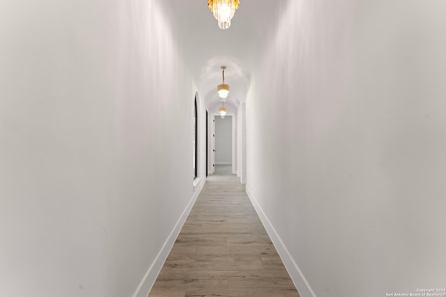 corridor featuring light wood-type flooring