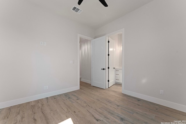 unfurnished bedroom featuring ceiling fan and light wood-type flooring