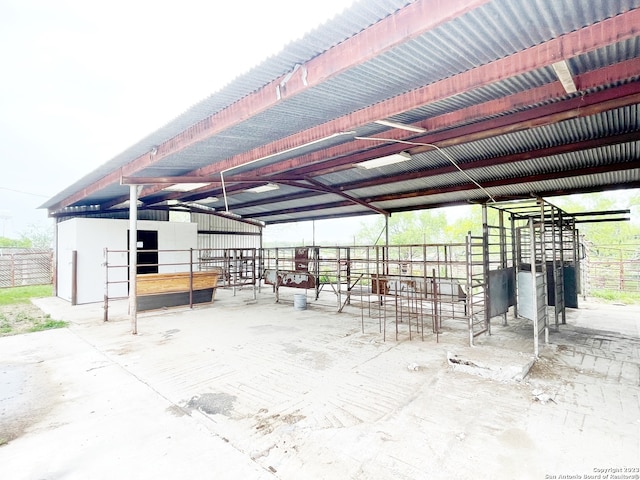 view of patio featuring an outdoor structure