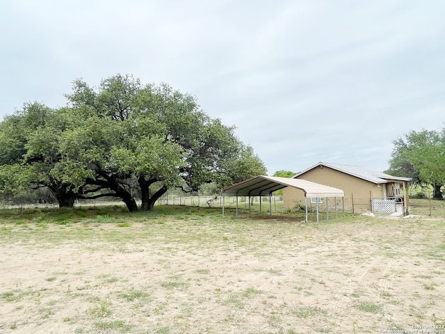 view of yard with a carport