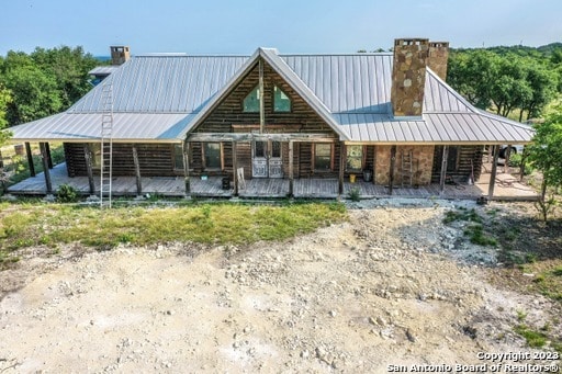 view of log-style house