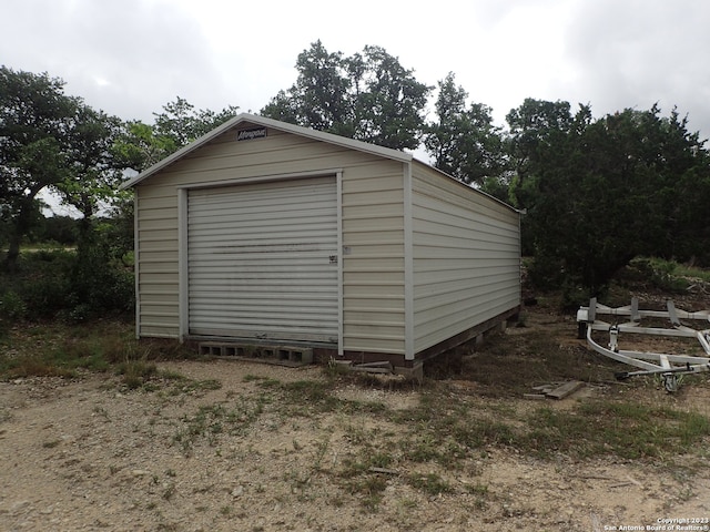 view of outbuilding with a garage