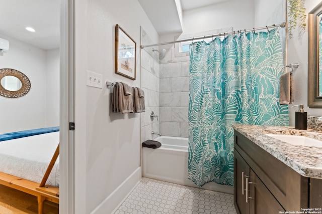 bathroom featuring tile floors, vanity, and shower / bathtub combination with curtain