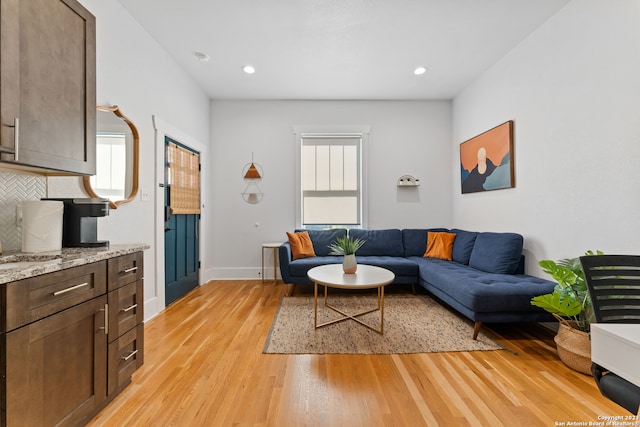 living room featuring light wood-type flooring