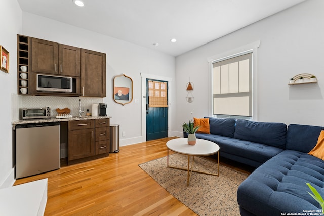 living room featuring light wood-type flooring