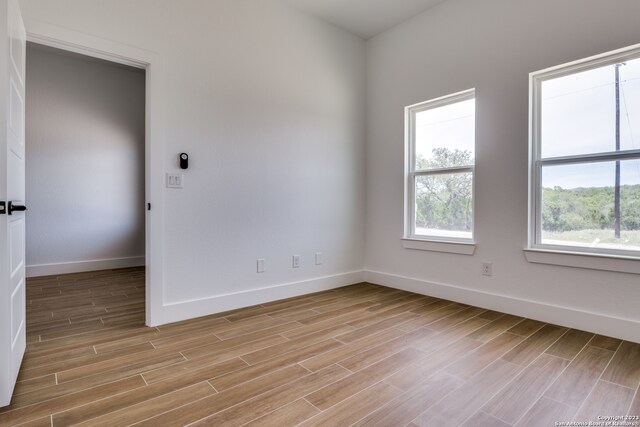 empty room featuring light hardwood / wood-style flooring