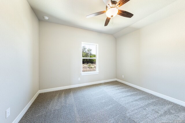 spare room with carpet and ceiling fan