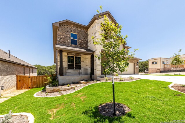 view of front of home with a front yard