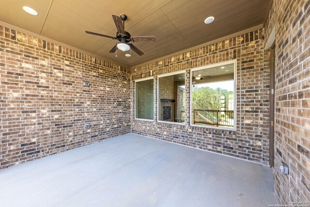 view of patio featuring ceiling fan