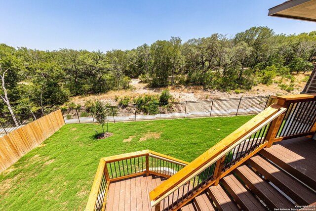 view of yard featuring a wooden deck